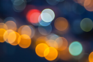 Abstract city lights blur blinking background. Soft focus horizontal long banner. Abstract blurred pattern template.