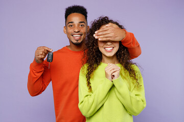 Young couple two friends family man woman of African American ethnicity wear casual clothes...