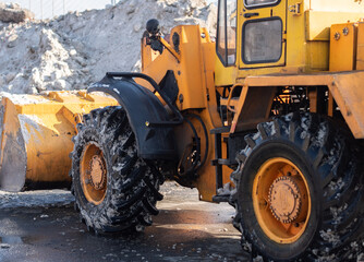 Removing snow after snowfall. Cleaning city street.