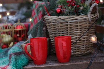 decorated Christmas cart with gifts, duvet, pillow, toys and spruce tree on the background