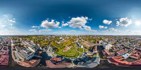 aerial full seamless spherical hdri 360 panorama view from great height on red roofs of historical...