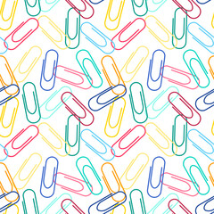 Repeat pattern office related items Color paper clips on white background