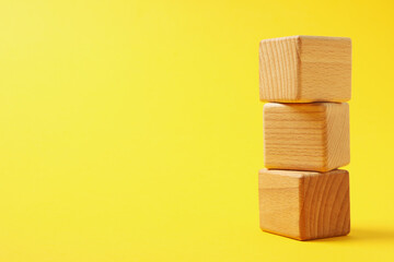 Blank wooden cubes for different concepts, space for text