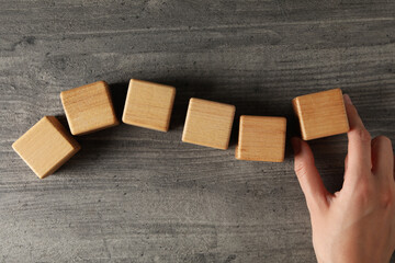 Blank wooden cubes for different concepts, top view