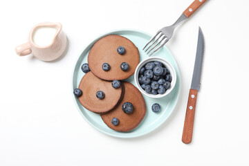 Concept of sweet food, chocolate pancakes, top view