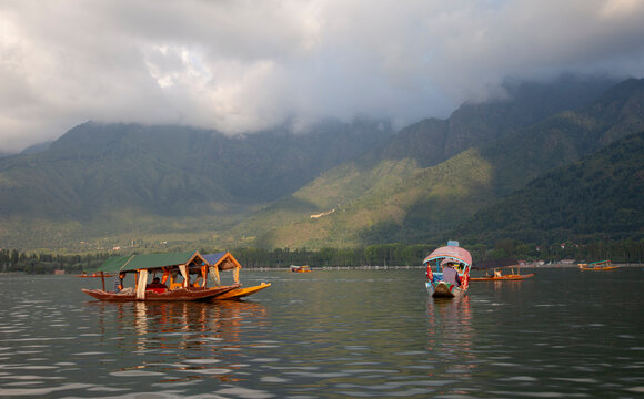 Dal Lake, Srinagar, Kashmir, India, mountains with clouds and fog