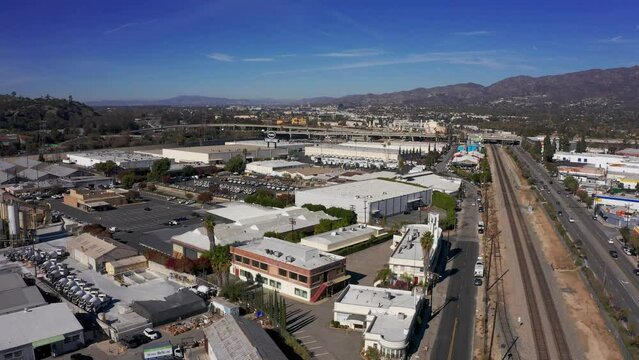 Aerial reverse pullback shot of the 134 Freeway where it meets the 5 Freeway in Glendale, California. 4K