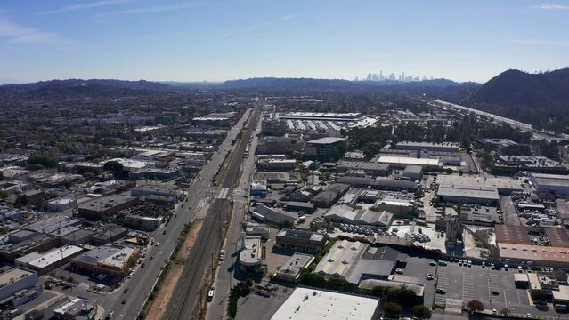 Panning aerial shot from downtown Los Angeles to the 5 Freeway in Glendale, California. 4K