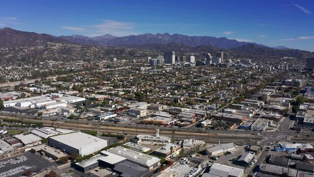 High and wide aerial panning shot of downtown Glendale, California. 4K