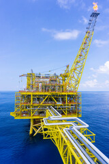 Oil drilling rig with the flair boom.