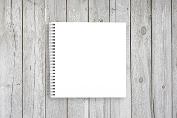 Square spiral notebook mockup for design, lettering, photo, picture or text presentation, empty...