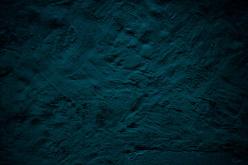 Teal colored abstract wall background with textures of different shades of teal