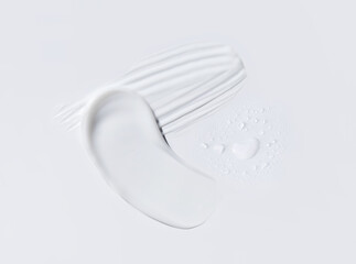 cosmetic smears cream texture on light gray background