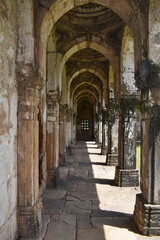 Jami Masjid, Archway corridor with intricate carvings in stone,  built by Sultan Mahmud Begada in 1509, Champaner-Pavagadh Archaeological Park, a UNESCO World Heritage Site, Gujarat, India