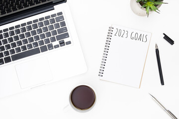 Notebook with 2023 goals text on it to apply new year resolutions and plan.