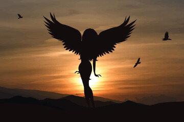 Vector silhouette of angel on sunset background. Symbol of faith and religion.