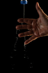 Water splashing on hand water captured at high speed slow motion showing unique patterns and...
