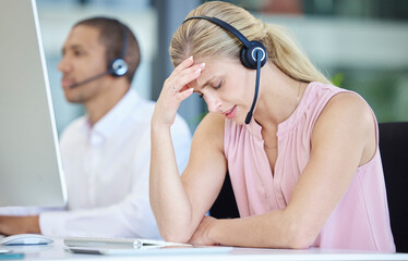 Stress, headache and call center consultant in the office doing online customer service...
