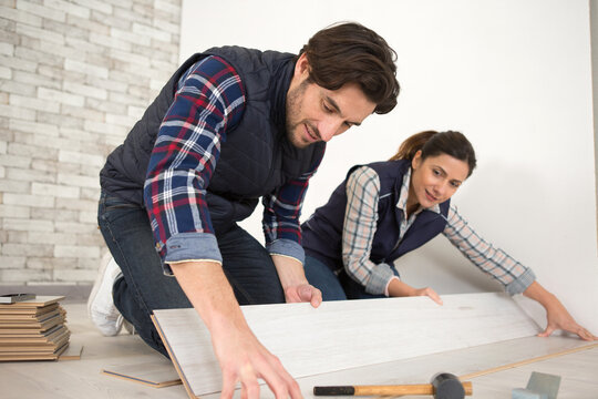 man and woman working together