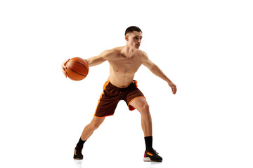 Fototapeta na wymiar Dribbling. Dynamic footage of professional basketball player training with basketball ball isolated over white background. Sport, action, active and healthy lifestyle