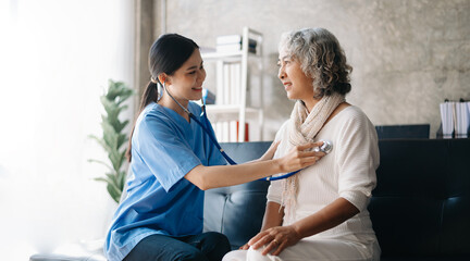 Fototapeta premium Senior woman being examined by a doctor