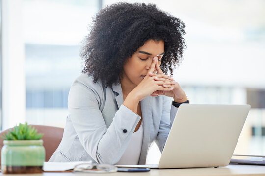 Stress, anxiety and burnout with a business black woman at work using a laptop while suffering from a headache. Compliance, computer and mental health with a female employee struggling on a deadline