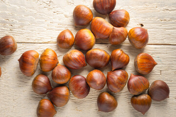Chestnuts on a rustic board