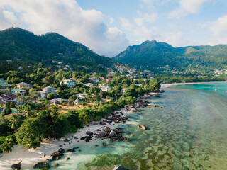 Aerial landscape overlooking the coastline of Mae Island in the Seychelles. Turquoise water of the Indian Ocean, tropical trees and beaches