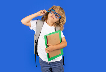 School teenager child with book and copybook. Teenager student, isolated background. Go study. Education learning and knowledge.