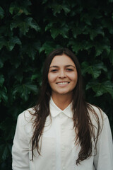 Girl Reading and Walking on Grass, Phone
