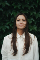 Girl Reading and Walking on Grass, Phone
