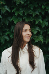 Girl Reading and Walking on Grass, Phone
