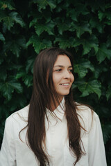 Girl Reading and Walking on Grass, Phone
