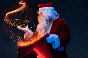 Portrait of new year santa dressed in red costume and magical locomative.