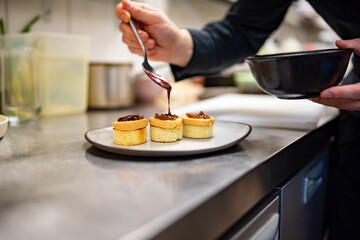 chef cooking Terrine of foie gras on kitchen