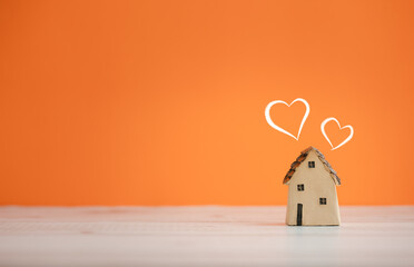 home model on orange color background