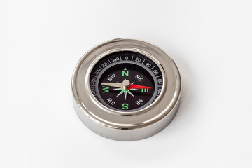 Direction choice concept with compass close up