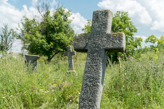 Old abandoned cemetary with burials of the Cossacks in Busha state Historical and Cultural Reserve, located in Busha village on Podillya, Vinnytsa region, Ukraine.
