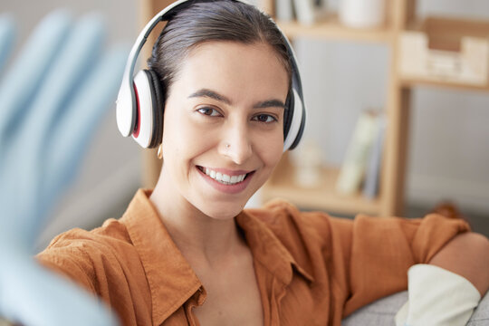 Cleaning, podcast or woman taking a selfie to relax on a break streaming music, audio or radio playlist at home. Face, portrait or happy cleaner resting by taking pictures and listening to headphones