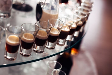 closeup of wineglasses with expensive alcoholic beverage. wedding reception.