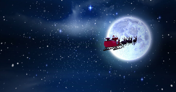 Image of snow falling over santa in sleigh