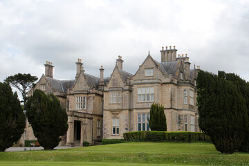 Muckross House was a stately residence and castle-like mansion and is located south of the Irish town of Killarney