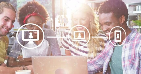 Animation of icons connected by line and dots forming shapes over diverse friends looking in laptop - Powered by Adobe