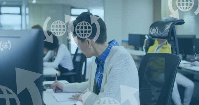 Animation of network of globe icons over business people in office