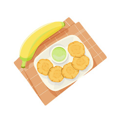Top view of fried bananas tostones, Latin American cuisine.