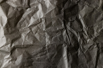 Close up of corrugated dark cardboard with copy space