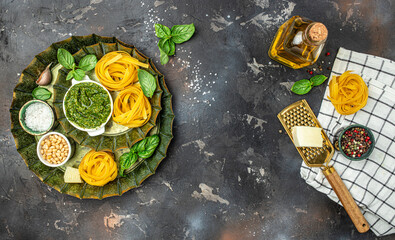 Fresh Italian pesto sauce with basil, pine nuts, parmesan cheese. Long banner format. top view