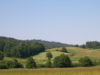 Fototapeta premium Hills, fields and meadows - beautiful landscape of Wiezyca.