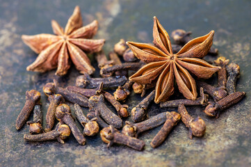 Christmas decoration aromatic spices, cloves and star anise in the kitchen, cooking banner