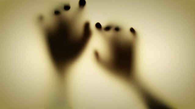 shadow's hand creeps behind the door, out of focus. Thriller, horror concept.